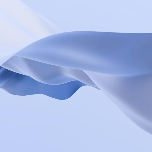 elegant flow of soft blue fabric in abstract form