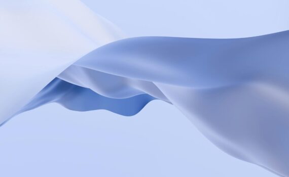 elegant flow of soft blue fabric in abstract form