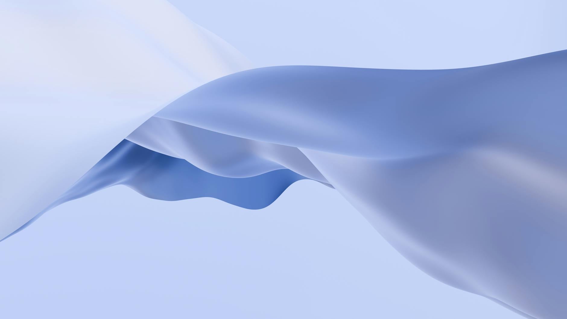 elegant flow of soft blue fabric in abstract form